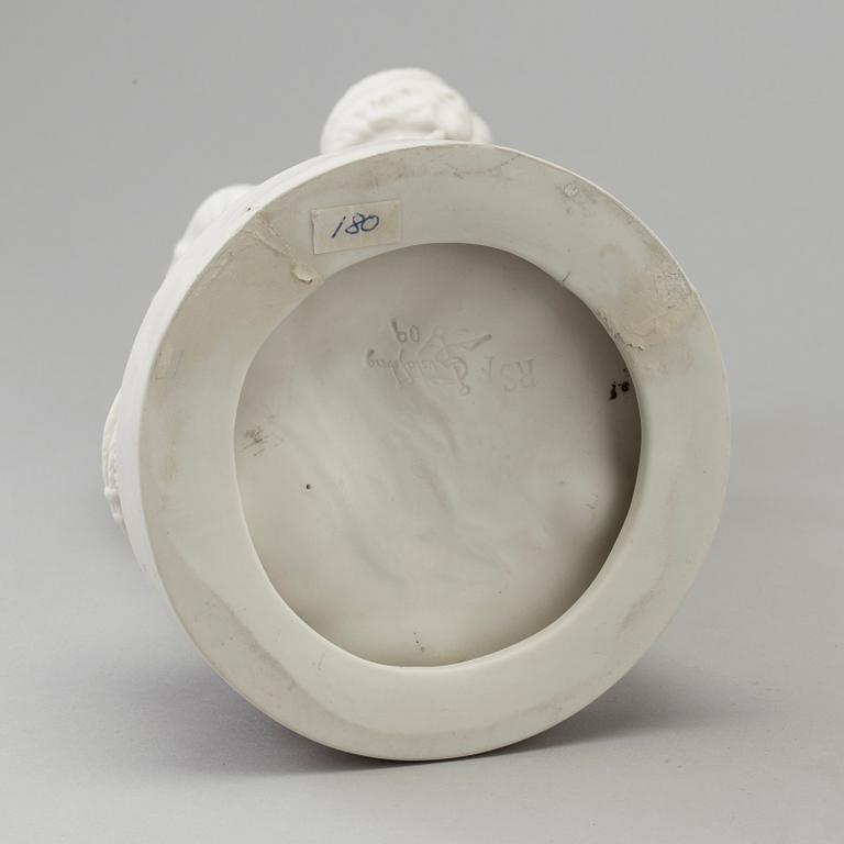 A biscuit figure of a woman and a boy, Gustafsberg, early 20th Century.