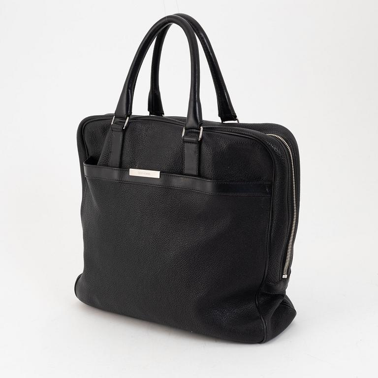 Christian Dior, a black leather briefcase.