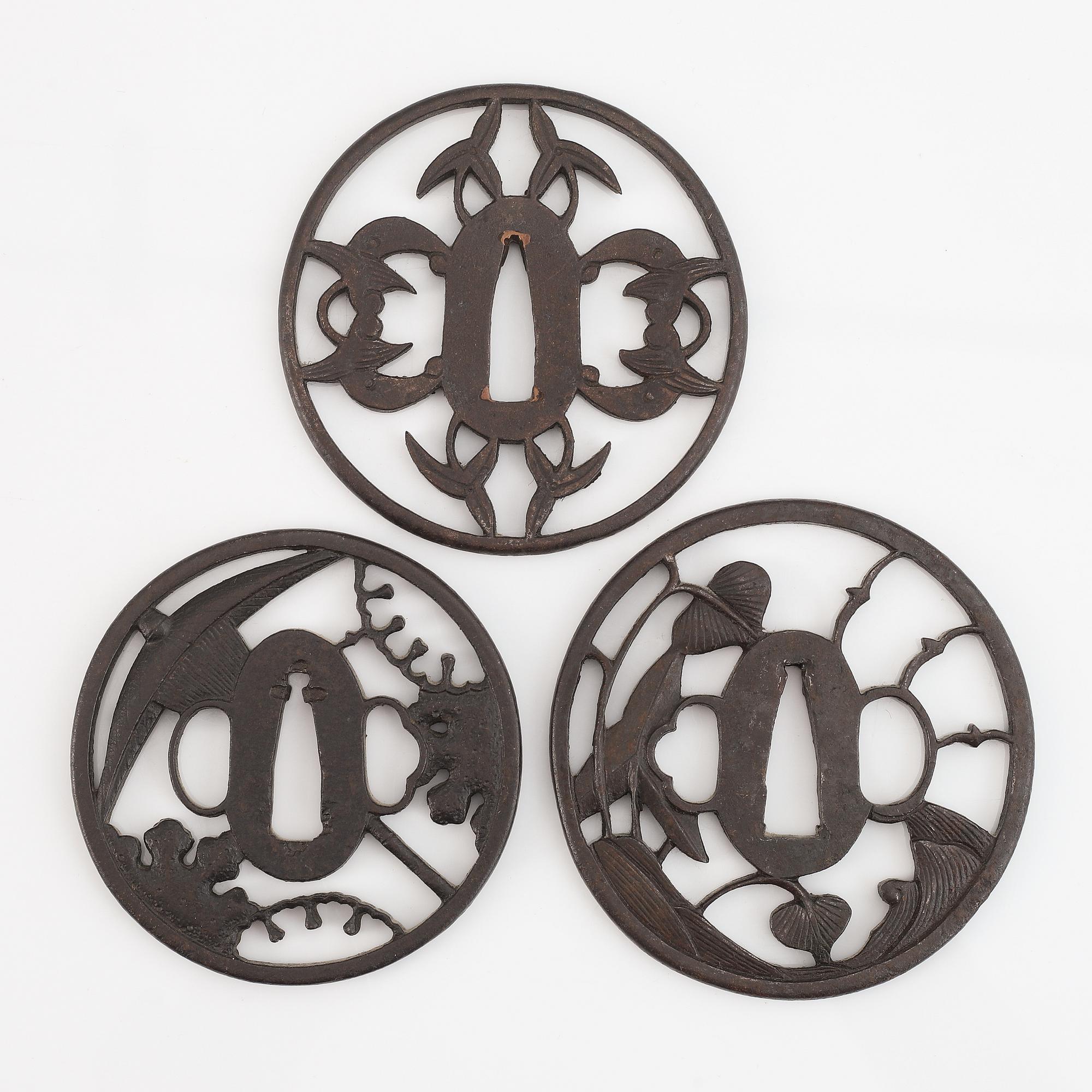 Three Japanese iron tsubas, probably 18th Century.