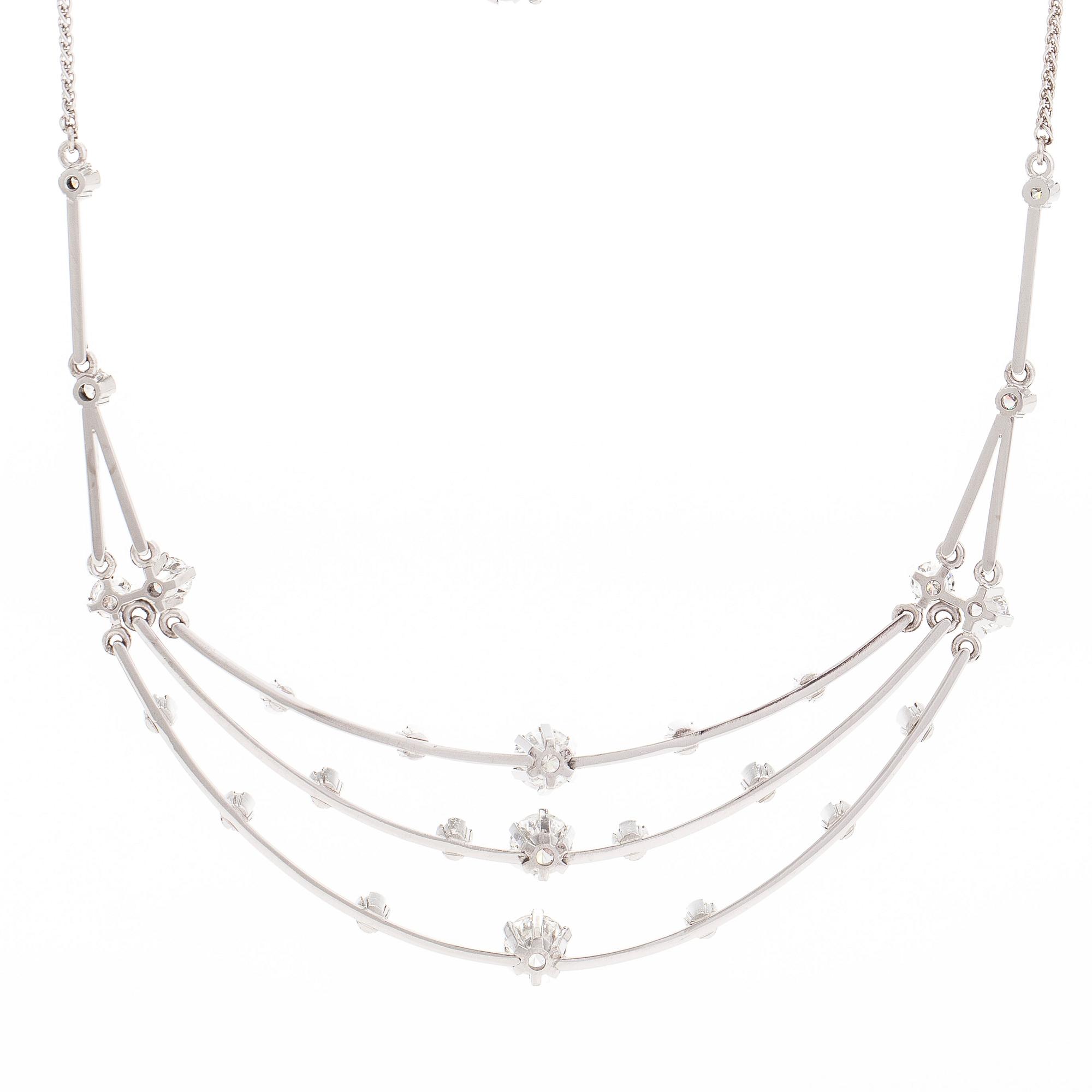 Collier, 18K vitguld med briljantslipade diamanter. A Tillander 1973.