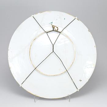 A large majolica 'istoriato' dish and two plates, 20th Century.