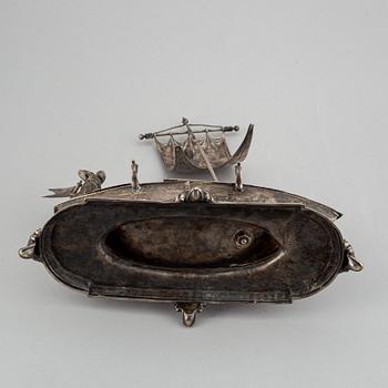 A silver plated inkwell, circa 1900.