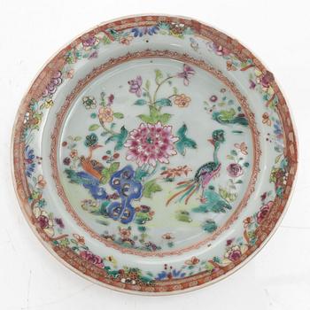 A small Chinese famille rose porcelain tureen with cover and stand, two salt cellars, Qing dynasty, Qianlong (1736-95).