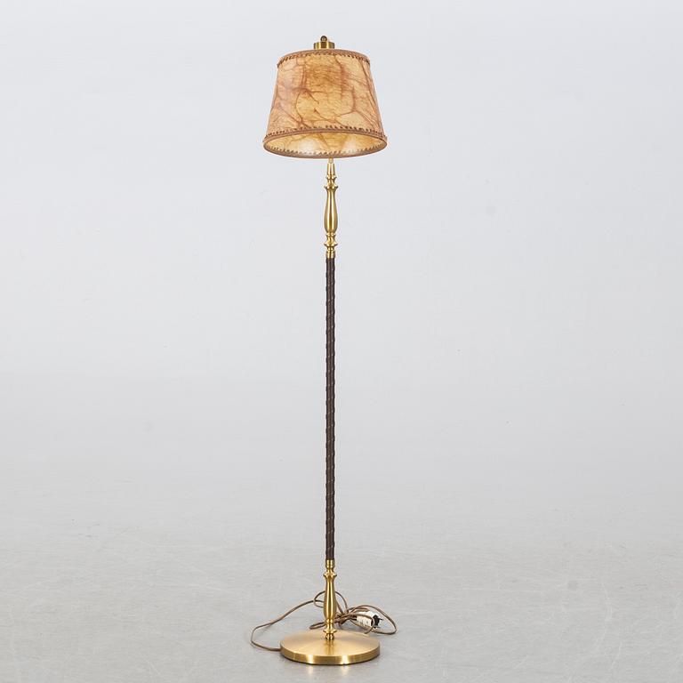 A floor lamp by Einar Bäckström, mid 20th century.