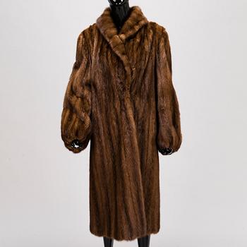 A SAGA MINK FUR COAT.