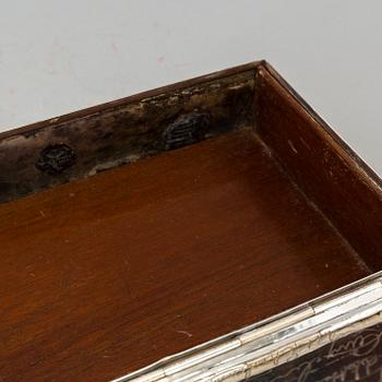 A silver cigar box by firma Karl Anderson in Stockholm 1927.