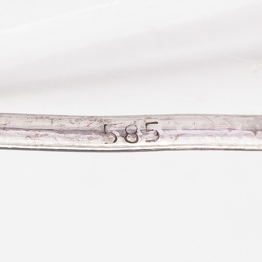 Korvakorupari, 14K valkokultaa sekä prinsesshiottuja timantteja yht n 0.08ct.