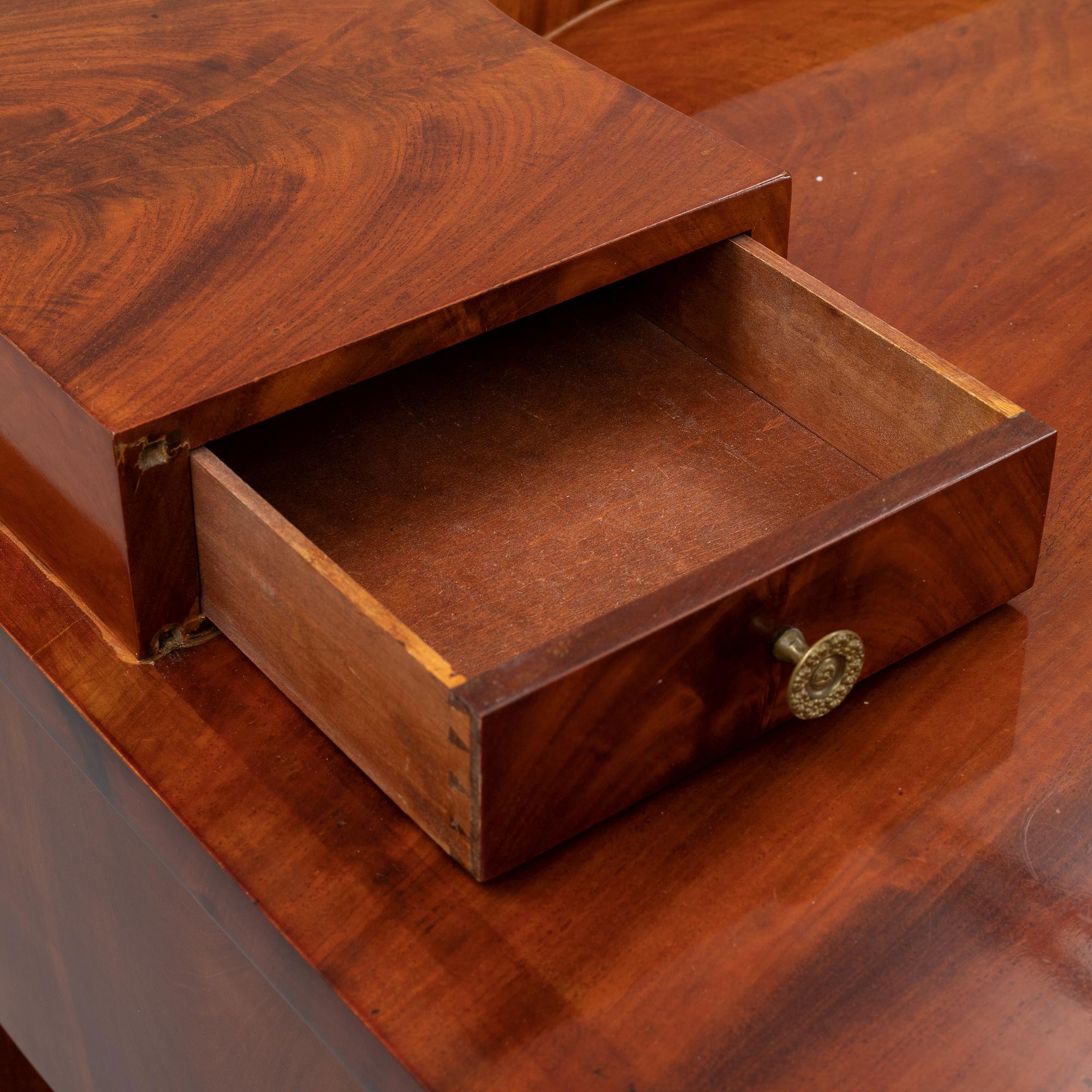 A mahogany console table, Stockholm, first half of the 19th century .