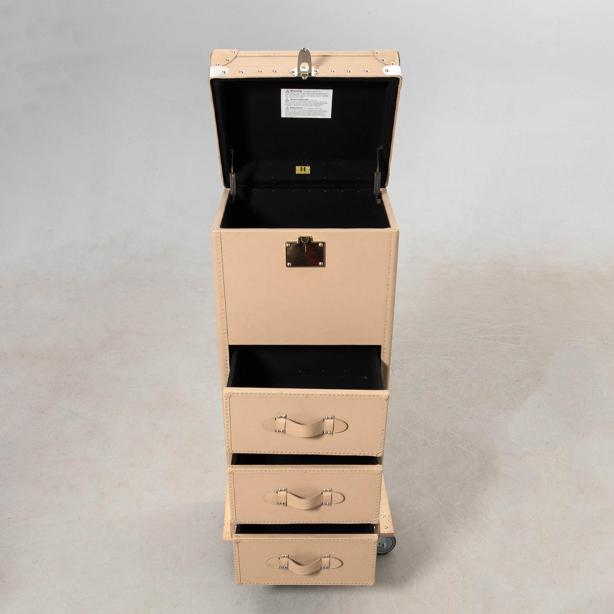 Translation: "Kelly Hoppen chest of drawers England modern production".