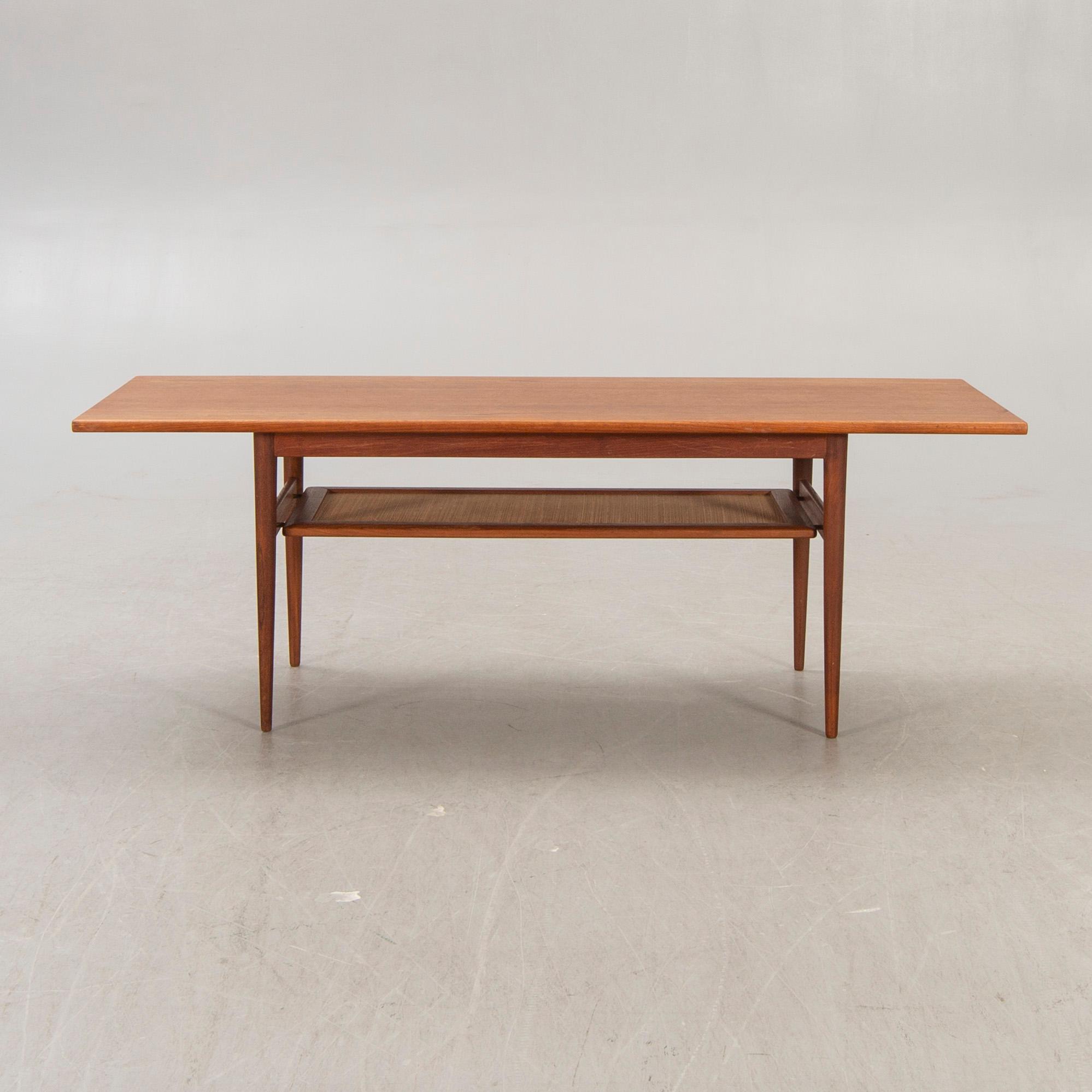 A Dansih 1960s teak and rattan  coffee table.