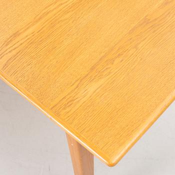 A dining table, 1960s.