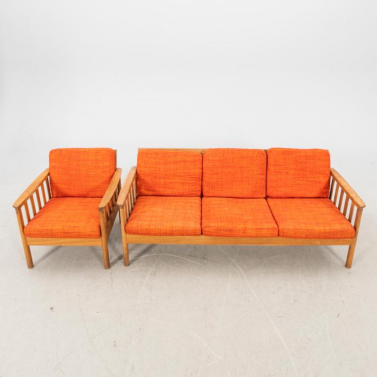 An oak easy chair ans sofa "Tiveden" by Gunnar Myrstrand & Sven Engström from the middle of the 20th century.