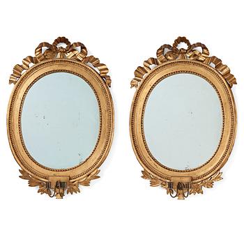 92. A pair of late Gustavian late 18th century two-light girandole mirrors.