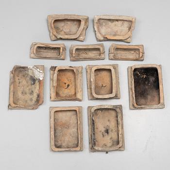 Eleven glazed earthenware tiles, 18th century.