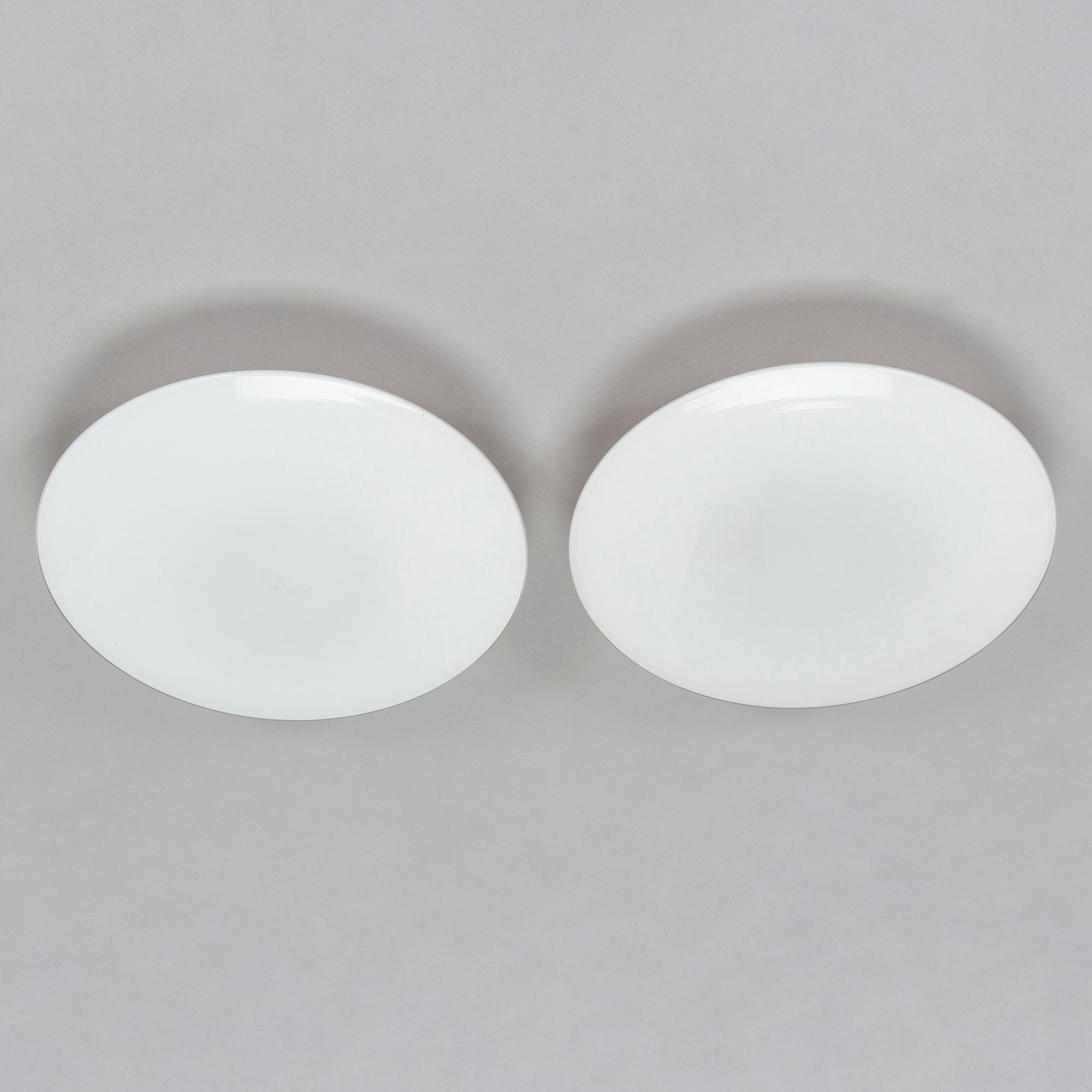 Arne Jacobsen, taklampor/ vägglampor, ett par, "AJ-Eklipta", Louis Poulsen, Danmark.