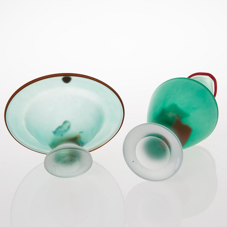 A glass bowl and decanter, signed, Kosta Boda, second half of 20th Century.