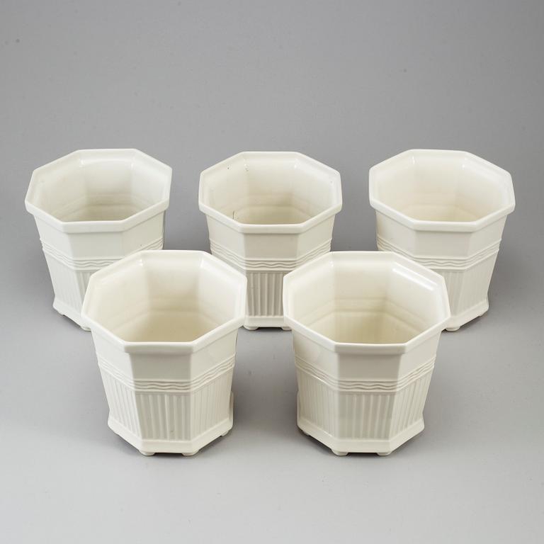 Five porcelain flowerpots by Prins Eugen.