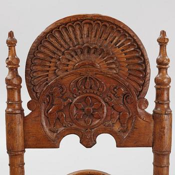 A pair of Spanish colonial style ladder-back chairs, circa 1900.