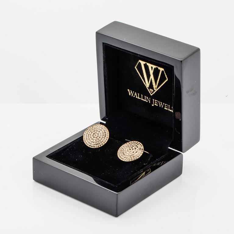 18K gold and black diamond cufflinks.