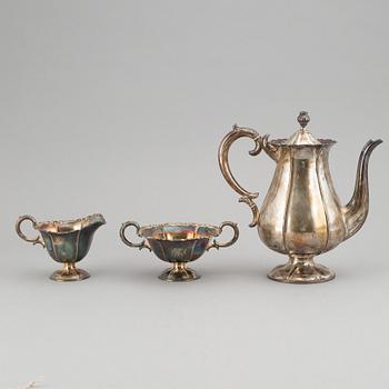 A silver coffee pot, creamer and sugar bowl. Kultakeskus Oy, Hämeenlinna, Finland 1943.