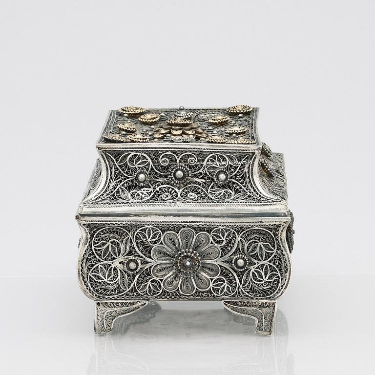 A 19th Century silver filigree box, unidentified makers mark R.K, Assay master mark of Ivan Lebedkin, Moscow 1898-1908.