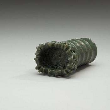 A green stone brush pot, China, 20th Century.