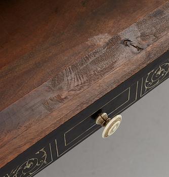 A Renaissance-style ebony, ebonized and ivory-inlaid library table, late 19th century, presumably Germany.