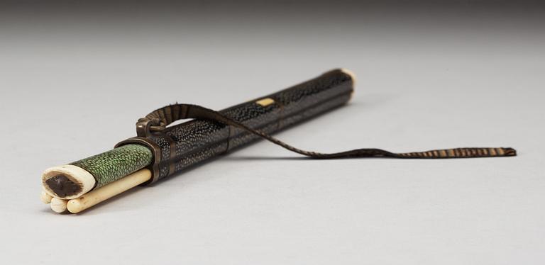 An ivory and shagreen chopstick holder, also with knife and fork, Qing dynasty (1644-1911).