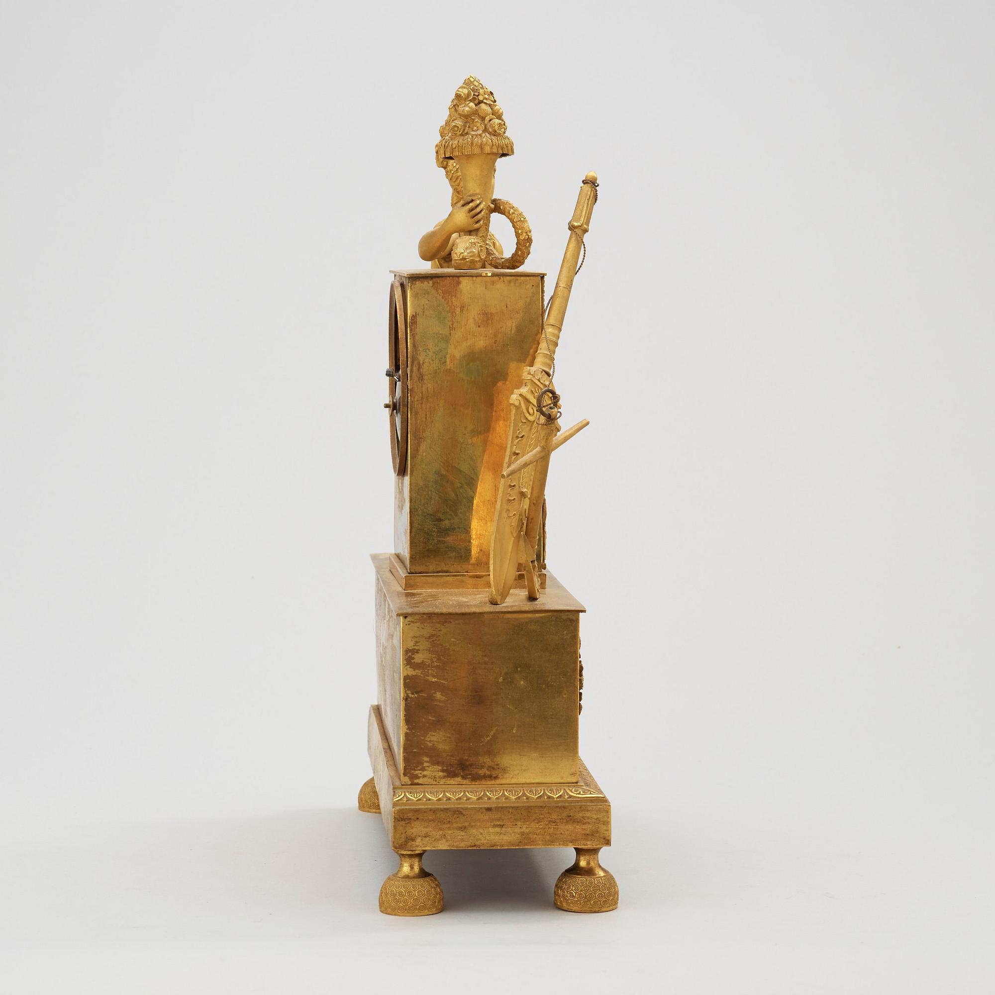 A French Empire early 19th century mantel clock.