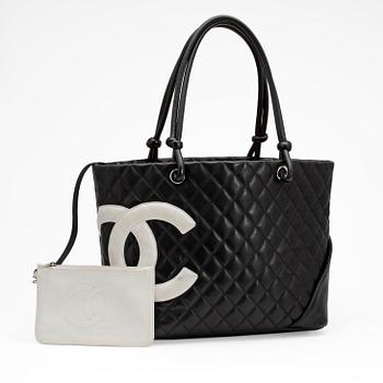 703. CHANEL, a black quilted leather "Shopping bag".