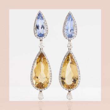 49. EARRINGS, set with blue and yellow beryls, circa 18.48 cts and diamonds circa 1.46 cts.