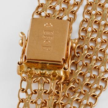 ARMBAND 18K, D Ekström, Falköping, 1981. Vikt 11,2 gram.