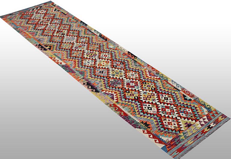 A runner carpet, Kilim, ca 388 x 85 cm.