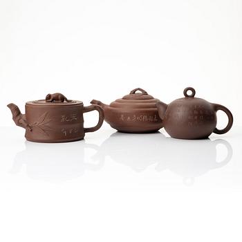 A group of three Chinese yixing teapots, 1960-80s.
