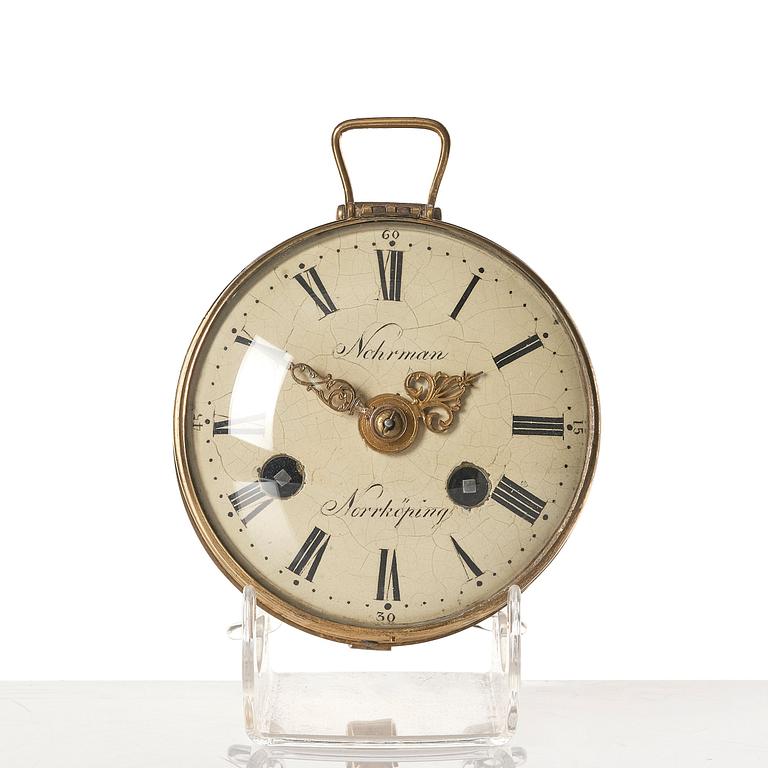 A gilt-brass travelling clock by E. Nohrman (active 1769-1779), with the monogram of Gustav III of Sweden, 1770's.