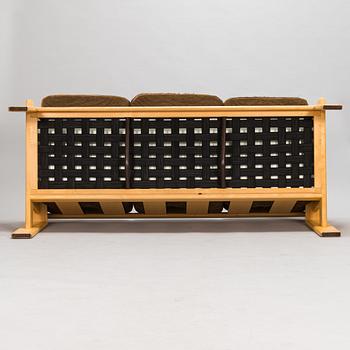 Esko Pajamies, A pair of 1970's 'Bonanza' armchairs, coffee table and sofa for Asko.