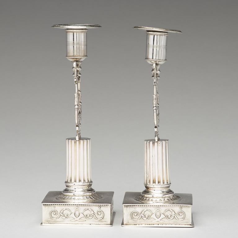 A pair of Swedish 19th century silver cadlesticks, mark of Johan Petter Grönvall, Stockholm 1823.