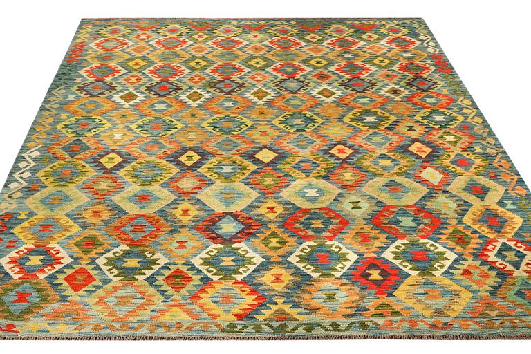 A Kilim carpet, c. 295 x 261 cm.