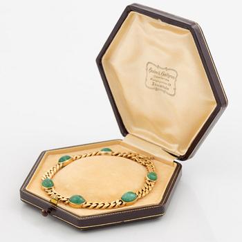 Bracelet in 18K gold with cabochon-cut emeralds, 1920s.