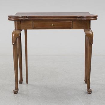 A mahogany games table, 18th Century.
