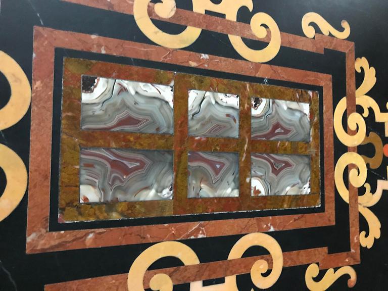 A pietre dure top, Italy, circa 1900, probably Rome or Naples. The stand in Louis XIV-style.