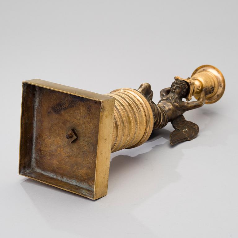 A ORMOLU CANDLESTICK, bronze and gilded bronze, empire early 19th century.
