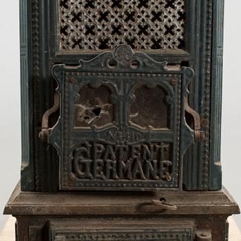 A cast iron stove, around 1900.