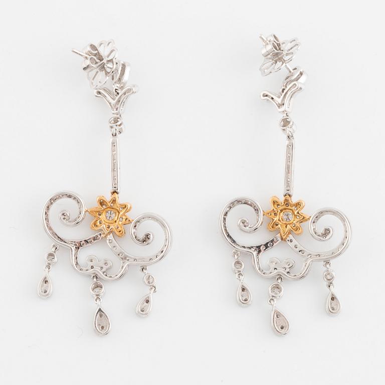 A pair of 18K white gold and round brilliant cut diamond chandelier earrings.