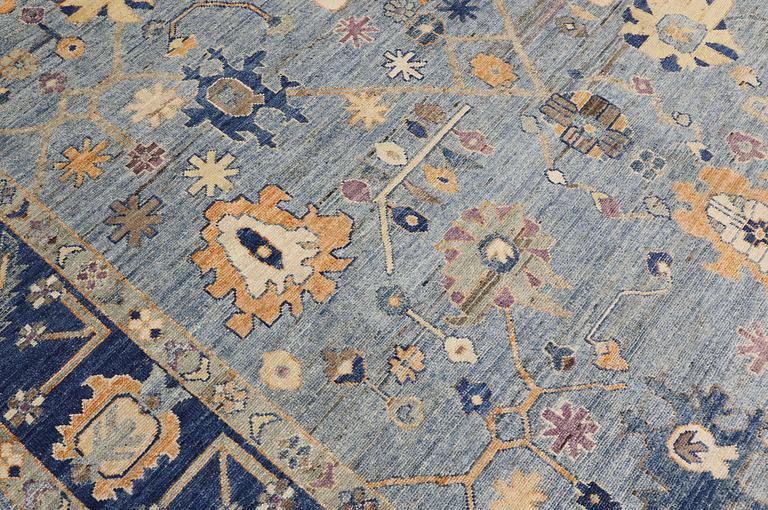 A carpet, Ziegler design, approx. 302 x 250 cm.