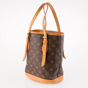 LOUIS VUITTON MONOGRAM PETIT BUCKET BAG WITH A POCHETTE.