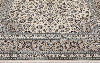 A Keshan carpet, approx. 355 x 250 cm.
