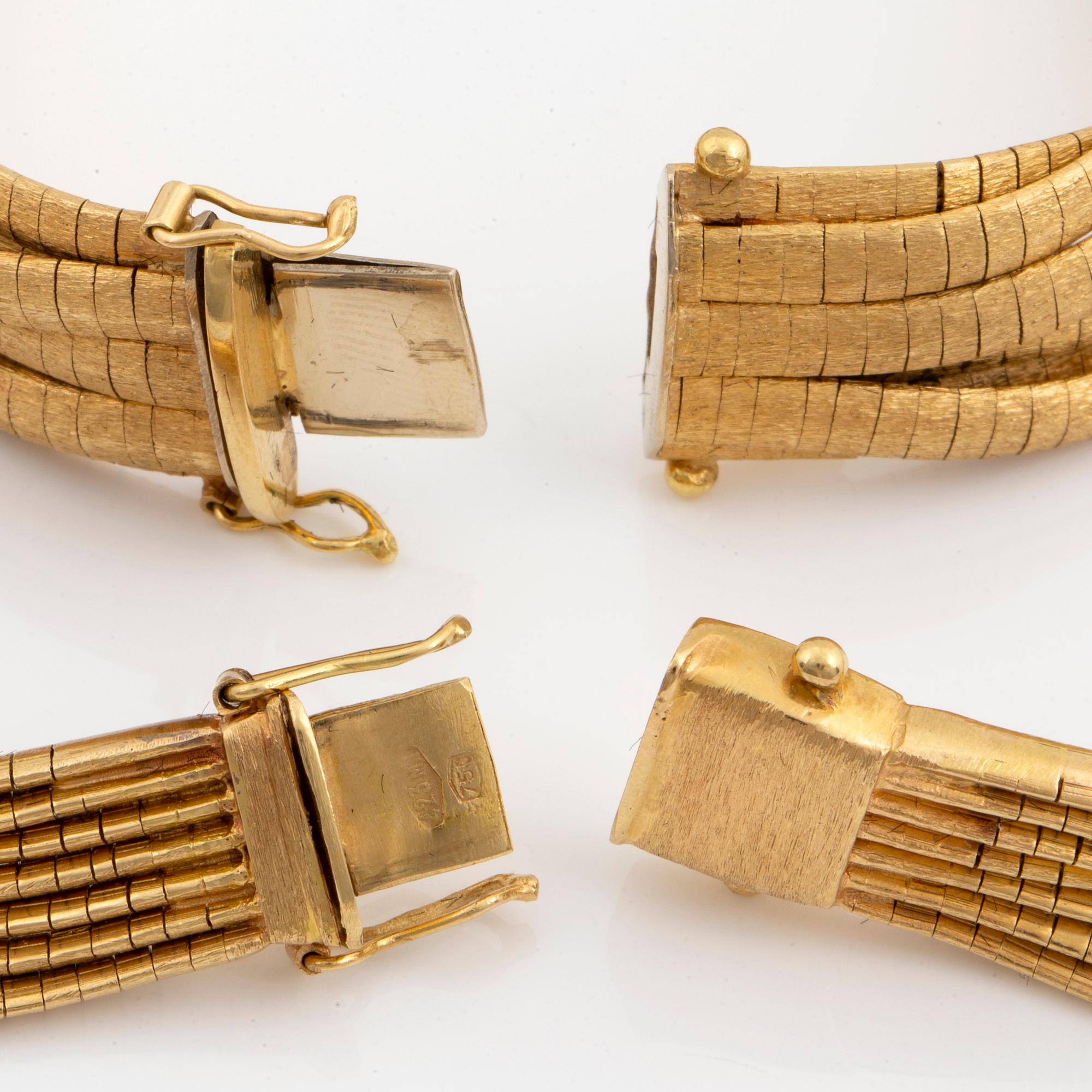 18K gold necklace and bracelet.