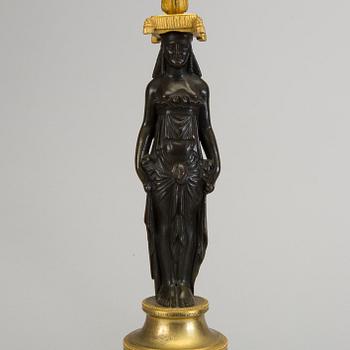 A pair of 1800s empire candelabras.