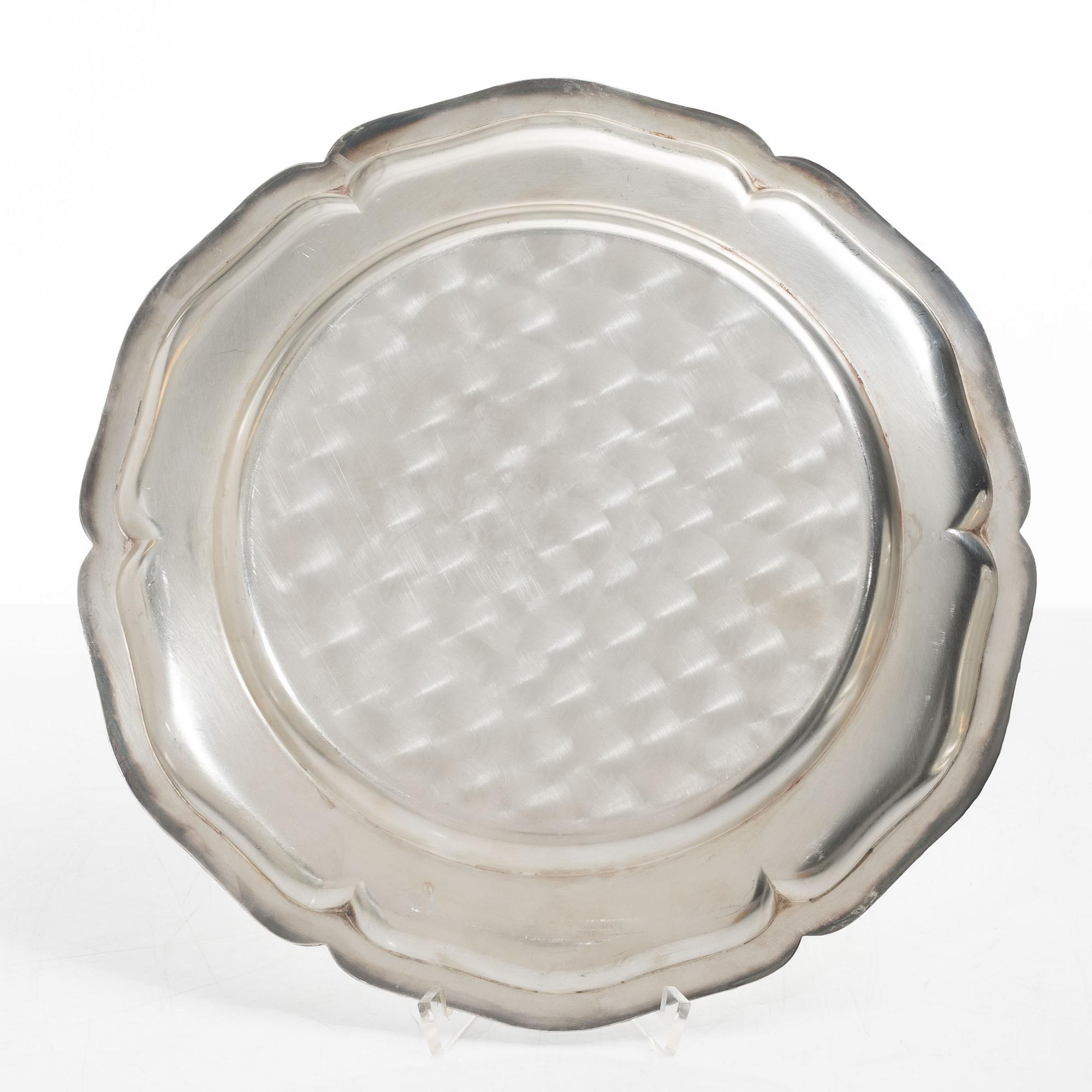 A set of seven silver plates (6+1), including GAB, Stockholm 1943.